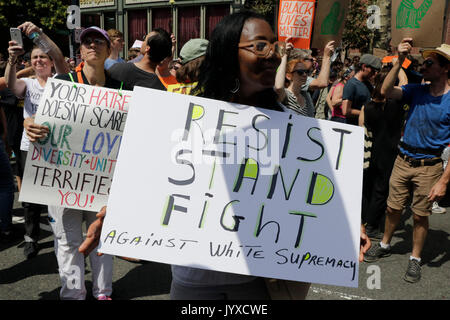Boston, Massachusetts, USA. 19th Aug, 2017. Bostonians march toward the Common against racial hatred and President Trump and a group of ''Free Speech'' demonstrators who they consider Nazis. Credit: Kenneth Martin/ZUMA Wire/Alamy Live News Stock Photo