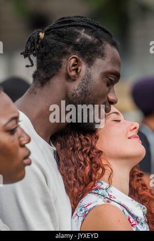 London, UK. 20th Aug, 2017. The crowd is multi ethnic but predominantly black and is entertained by thought provoking music amd poetry - An anti slavery event is organised by My Tribe in Trafalgar Sqaure to coincide with International Slavery Remembrance Day, for victims of the Transatlantic Slave Trade, which is on August 23rd. London 20 Aug 2017. Credit: Guy Bell/Alamy Live News Stock Photo