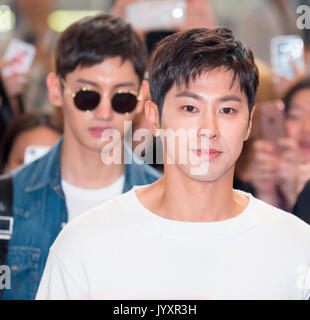 U-Know Yunho and Max Changmin (TVXQ), Aug 21, 2017 : U-Know Yunho (front) and Max Changmin of K-pop duo TVXQ arrive at the Gimpo International Airport in Seoul, South Korea before they depart to Tokyo, Japan to hold a press conference. The K-pop boy band began three-country 'Asian Press Tour' in Seoul on Monday to mark their resumption of activities after they were discharged from about two years of mandatory military service. They will hold a press conference in Tokyo on August 21 and in Hong Kong on August 22, 2017, according to local media. Credit: Lee Jae-Won/AFLO/Alamy Live News Stock Photo