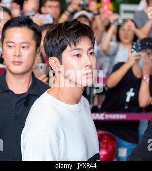 U-Know Yunho (TVXQ), Aug 21, 2017 : U-Know Yunho (front) of K-pop duo TVXQ arrives at the Gimpo International Airport in Seoul, South Korea before the boy band depart to Tokyo, Japan to hold a press conference. The K-pop boy band began three-country 'Asian Press Tour' in Seoul on Monday to mark their resumption of activities after they were discharged from about two years of mandatory military service. They will hold a press conference in Tokyo on August 21 and in Hong Kong on August 22, 2017, according to local media. Credit: Lee Jae-Won/AFLO/Alamy Live News Stock Photo
