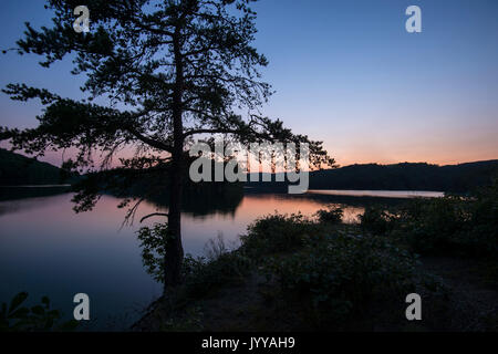 Sunrise On Beautiful Calm Mountain Lake Stock Photo