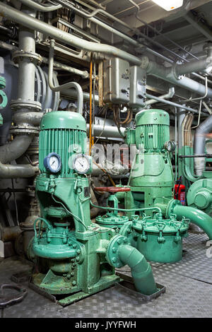 Engine water pumps in the pump room of the ship. Stock Photo