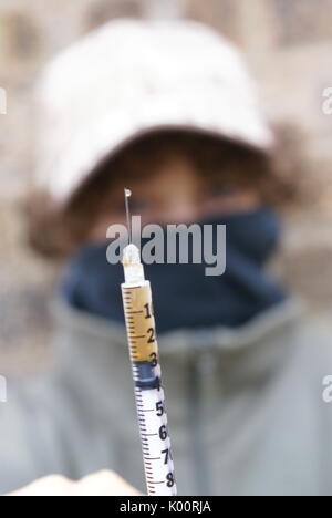 in position of class A drugs, teenager arrested for dealing drugs Stock Photo