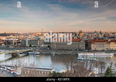 Sunset on the historical bridges and buildings reflected on Vltava (Moldava) river Prague Czech Republic Europe