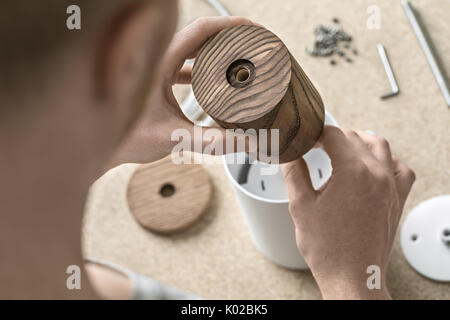 Lamp assembling in workshop Stock Photo