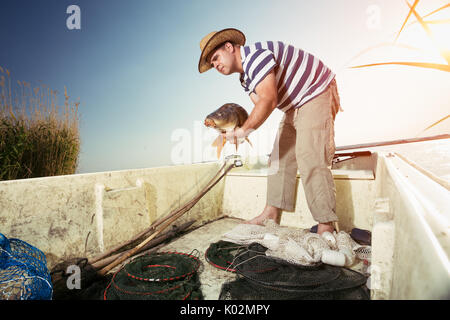 Big carp fisherman catch Stock Photo - Alamy