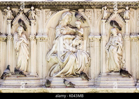 Detail of Fonte Gaia (Fountain of Joy) on Piazza del Campo (Campo Square) in Siena. Tuscany, Italy Stock Photo