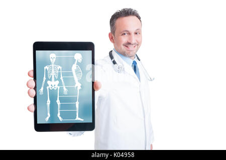 Smiling medic showing tablet pc computer screen with human skeleton isolated on white background with copyspace Stock Photo