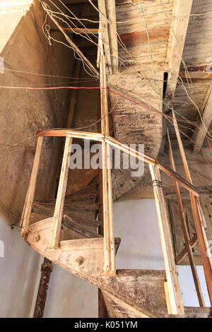 Achitecture and wooden staircase in neglected residenial house in Old Havana, Cuba Stock Photo