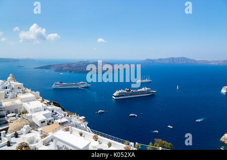 Cruise liners moored in the caldera at Fira (Thira, Thera) capital of Santorini, a Greek island in the Cyclades group in the Aegean Sea Stock Photo
