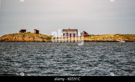 Swedish cottages off the Swedish coast in Varberg Stock Photo