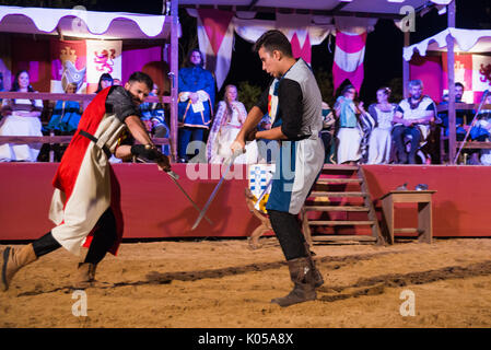 Alburquerque, Spain - august 19, 2017: Two knights fighting during Medieval  festival in Alburquerque, Extremadura, Spain Stock Photo