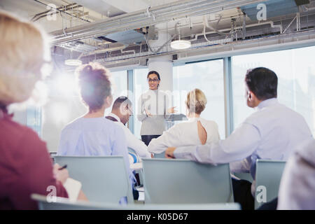 Businesswoman leading conference room meeting Stock Photo