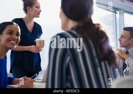 Business people talking in conference room meeting Stock Photo