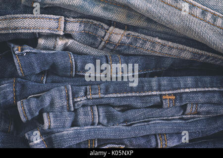 Stack of jeans. Close up. Stock Photo