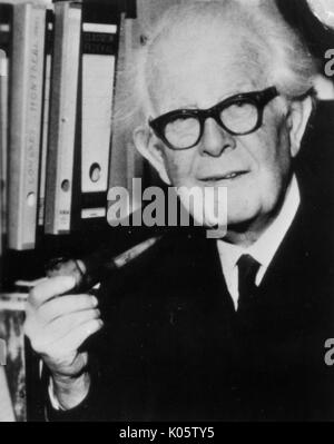 Half length portrait of clinical psychologist Jean Piaget wearing