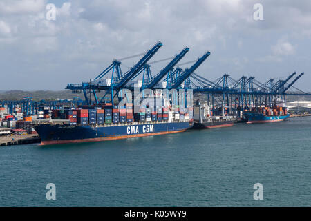 Colon, Panama.  Container Ship and Container Cranes in the Port. Stock Photo