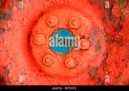 colourful old tractor wheel hub Stock Photo