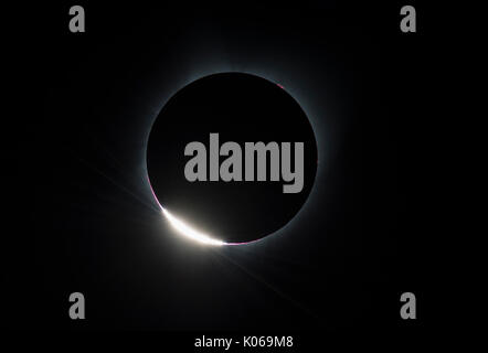 The Diamond Ring effect is seen as the moon makes its final move over the sun during the total solar eclipse on Monday, August 21, 2017 above Madras, Oregon. A total solar eclipse swept across a narrow portion of the contiguous United States from Lincoln Beach, Oregon to Charleston, South Carolina. A partial solar eclipse was visible across the entire North American continent along with parts of South America, Africa, and Europe. Mandatory Credit: Aubrey Gemignani/NASA via CNP /MediaPunch Stock Photo