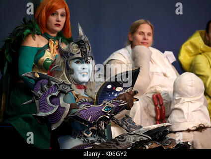 Cologne, Germany. 22nd Aug, 2017. Cosplayers at the Gamescom in Cologne, Germany, 22 August 2017. The gaming expo runs through to the 16 August. This year's expo was officially opened by the German chancellor Angela Merkel. Photo: Oliver Berg/dpa/Alamy Live News Stock Photo