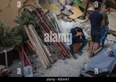 Casamicciola, Italy. 22nd Aug, 2017. A magnitude 3.6 earthquake knock was heard in Ischia late in the day on August 21st. Several collapses, including a palace and a church, numerous wounded. From the rubble between 21 and 22 August, three young brothers were taken live. Two victims found out. (Italy, Ischia, Casamicciola, August 22, 2017) Credit: Independent Photo Agency Srl/Alamy Live News Stock Photo