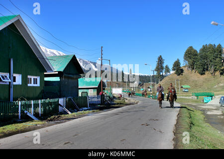 Cowboys riding on their horses at Gulmarg, India. Majestic, adventure. Stock Photo