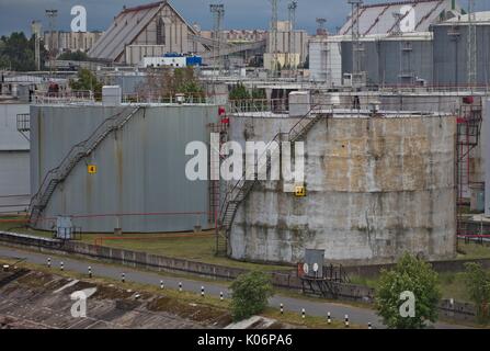 Old large refinery petrol tanks in St. Petersburg, Russia Stock Photo