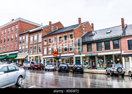 Belfast, USA - June 9, 2017: Empty small village in Maine during rain with stores on steep hill main street Stock Photo