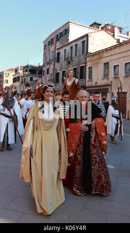 Venice,Italy,February 26th 2011: Medieval characters marching in a costume parade in Venice during The Carnival days.The Carnival of Venice (Carnevale Stock Photo