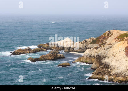 Rugged coastline of Pacific shore cliffs Stock Photo