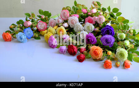 Colorful roses flower background, group of multicolor rose make from clay, handmade product from clever of hand, ornament from clay art so amazing Stock Photo