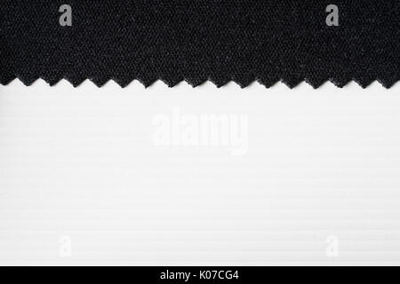 Striped embossed paper and fabric. White and black background. textile and wallpaper texture. Stock Photo