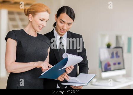 Team Analyzing Financial Figures Stock Photo