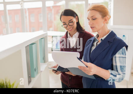 Interior Designers Having Project Discussion Stock Photo