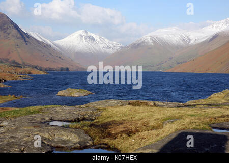 Looking across Wastwater towards a snow-capped Great Gable and Lingmell, Cumbria, Lake District, UK. Stock Photo