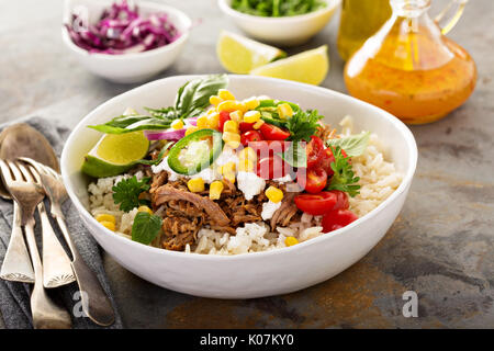 Dinner bowl with rice and pulled pork Stock Photo