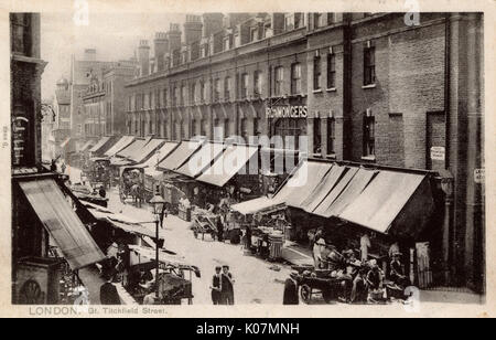 View of Great Titchfield Street, London, on the corner of Langham Street, showing an aerial view of the street market.   circa 1905 Stock Photo