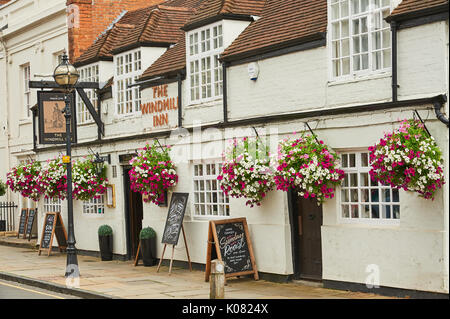 The Windmill Inn in Stratford upon Avon, decked out in colourful hanging baskets. Stock Photo