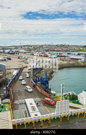 HGV and private cars being loaded onto a ferry in the North Wales port of Holyhead Stock Photo