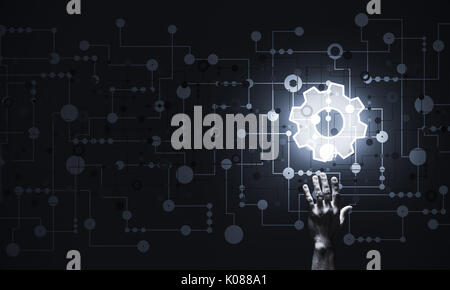 Technology conceptual image with gear digital symbol on dark bac Stock Photo