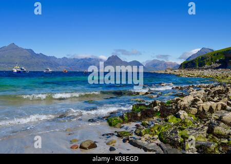 The beach at Elgol looking across Loch Scavaig towards the Cuillin Mountain range. Stock Photo