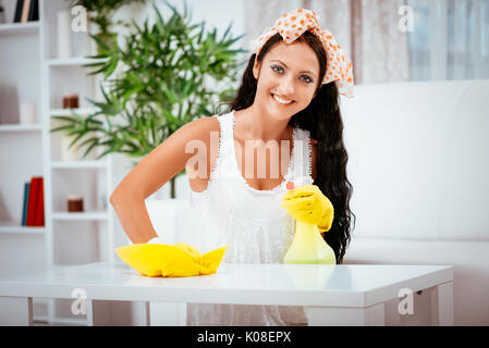 Young women clean the table Stock Photo by ©photographee.eu 117322610