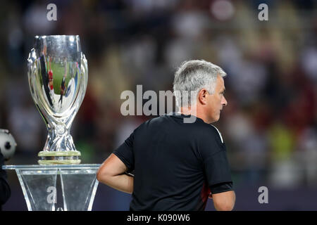 Skopje, FYROM - August 8,2017: Manchester United manager Jose Mourinho passes the UEFA Super Cup after the UEFA Super Cup match at the Philip II Arena Stock Photo