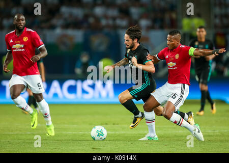 Skopje, FYROM-August 8,2017:Real Madrid Isco (L) and Manchester United Antonio Valencia (R) during the UEFA Super Cup Final match between Real Madrid  Stock Photo