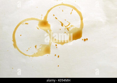 Two round Coffee stains isolated on white backgound Stock Photo