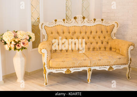 Classic Interior Of Living Room With Sofa And Big vase Stock Photo