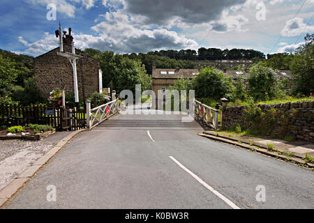 Level Crossing at Oakworth Station on the Keighley & Worth Valley Railway line in West Yorkshire. Stock Photo