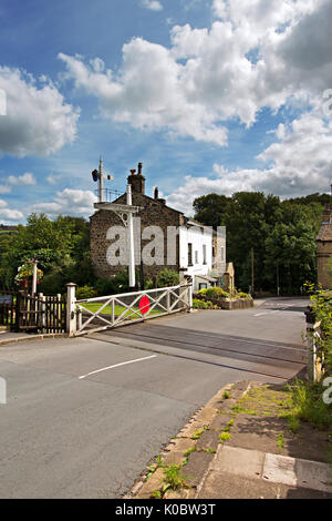 Level Crossing at Oakworth Station on the Keighley & Worth Valley Railway line in West Yorkshire. Stock Photo