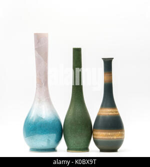 Modern pottery vases with beautiful patterns isolated on white background Stock Photo