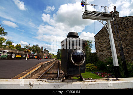 Level Crossing at Oakworth Station on the Keighley & Worth Valley Railway line in West Yorkshire. Stock Photo